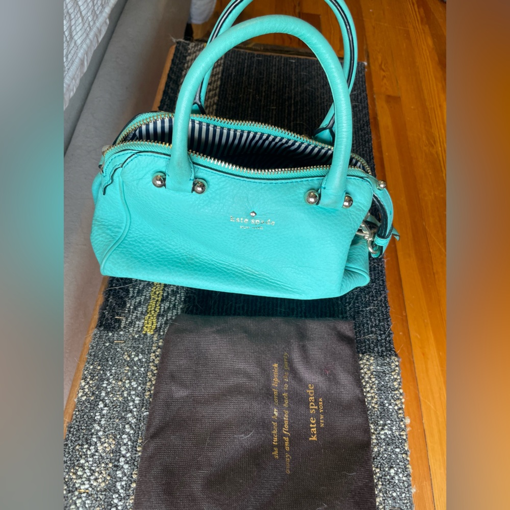 Teal Kate Spade smaller bag with dust bag